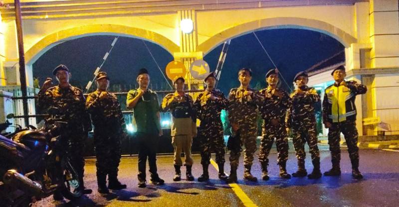 SATKORCAB Banser NU OKU patroli dì dalam kota Baturaja, Kabupaten OKI. 