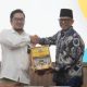 Bupati OKU Teddy Meilwansyah saat menyerahkan laporan keuangan 2025 kepada BPK RI Perwakilan Sumatera Selatan di Palembang